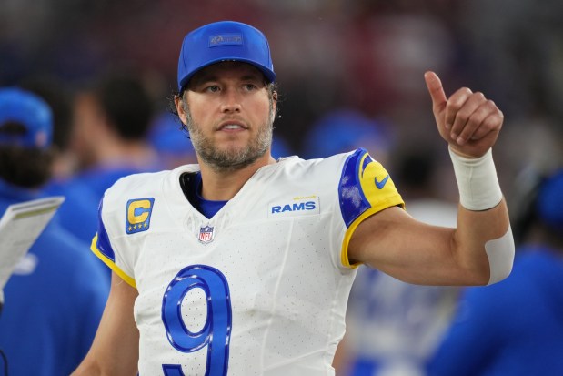 Rams quarterback Matthew Stafford gestures as he walks off the field following their victory over the Arizona Cardinals on Sunday in Glendale, Ariz. (AP Photo/Rick Scuteri)