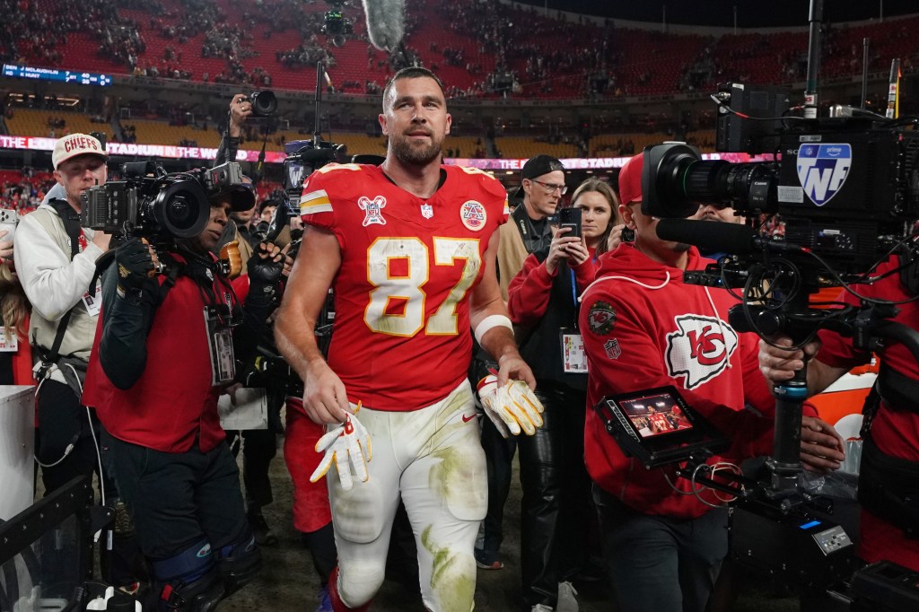 Kansas City Chiefs tight end Travis Kelce walks on the field following an NFL football game against the Denver Broncos Thursday, Dec. 25, 2025, in Kansas City. 
