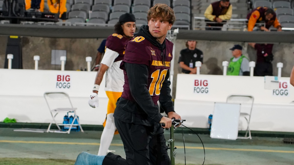 ASU QB Sam Leavitt on scooter in cast after loss to Arizona (Jeremy Schnell/Arizona Sports)...
