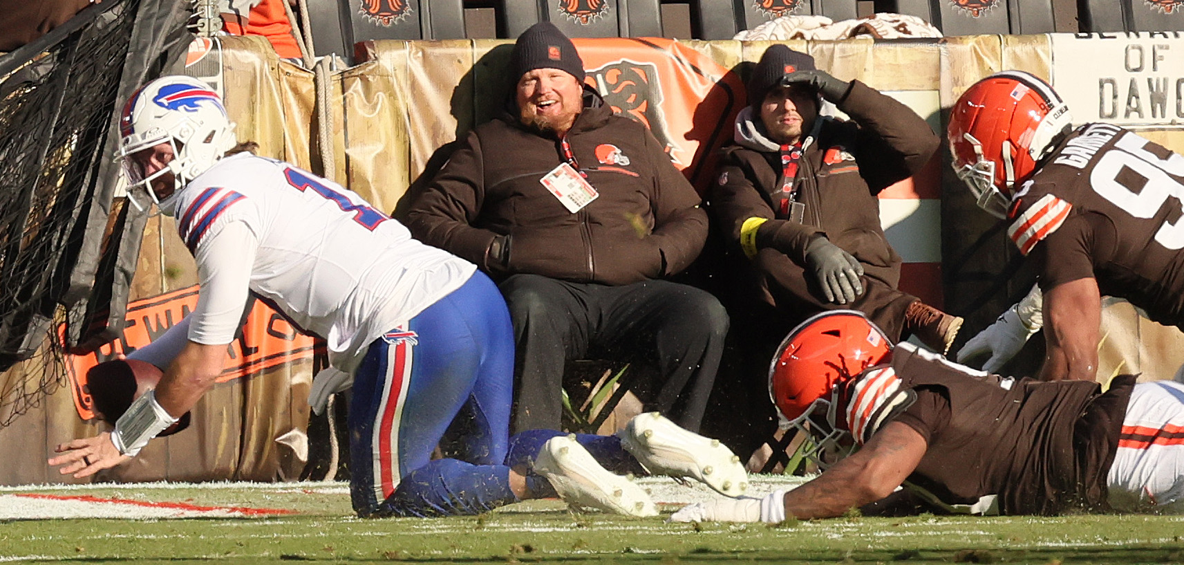 Buffalo Bills quarterback Josh Allen falls to the turf where Cleveland Browns defensive end Myles Garrett earned a half sack on the play in the first half. 
