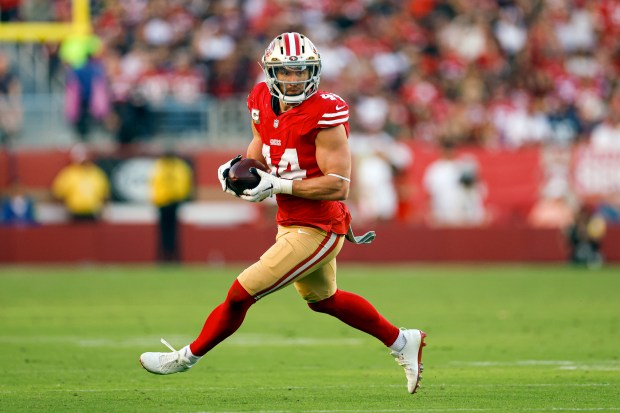 San Francisco 49ers' Kyle Juszczyk (44) runs with the ball against the Los Angeles Rams during the third quarter at Levi's Stadium in Santa Clara, Calif., on Sunday, Nov. 9, 2025. (Shae Hammond/Bay Area News Group)