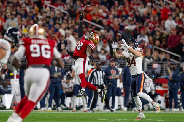 San Francisco 49ers' Tatum Bethune (48) almost intercepts a pass intended for Chicago Bears' Colston Loveland (84) in the first quarter of their NFL game at Levi's Stadium in Santa Clara, Calif., on Sunday, Dec. 28, 2025. (Jose Carlos Fajardo/Bay Area News Group)