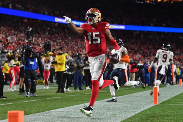 San Francisco 49ers' Jauan Jennings (15) gestures after scoring a touchdown against the Chicago Bears in the fourth quarter of their NFL game at Levi's Stadium in Santa Clara, Calif., on Sunday, Dec. 28, 2025. The San Francisco 49ers defeated the Chicago Bears 42-38. (Jose Carlos Fajardo/Bay Area News Group)
