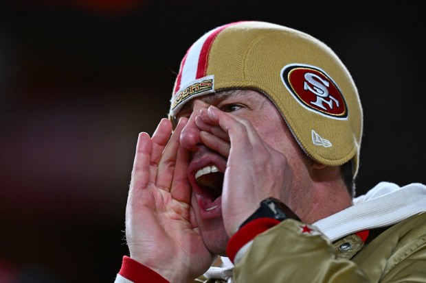 A San Francisco 49ers fan cheers during the final plays of the fourth quarter of their NFL game at Levi's Stadium in Santa Clara, Calif., on Sunday, Dec. 28, 2025. The San Francisco 49ers defeated the Chicago Bears 42-38. (Jose Carlos Fajardo/Bay Area News Group)
