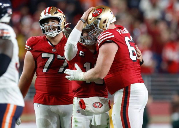 San Francisco 49ers starting quarterback Brock Purdy (13) celebrates his touchdown pass with San Francisco 49ers' Austen Pleasants (62) against the Chicago Bears in the fourth quarter at Levi's Stadium in Santa Clara, Calif., on Sunday, Dec. 28, 2025. (Nhat V. Meyer/Bay Area News Group)