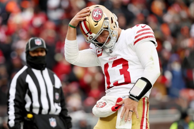 San Francisco 49ers quarterback Brock Purdy (13) celebrates after scoring a touchdown during an NFL football game against the Cleveland Browns, Sunday, Nov. 30 2025, in Cleveland. (AP Photo/Kirk Irwin)