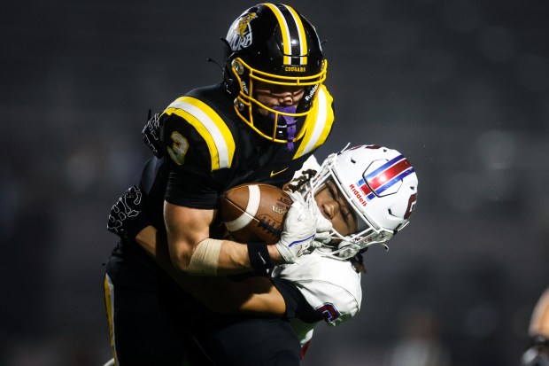 St. Ignatius' Shermar Noriega (37) tackles Ventura's Jack Cunningham (3) in the fourth quarter during the Division 3-AA state championship football game at Fullerton Union High School District Stadium in Fullerton, Calif., on Friday, Dec. 12, 2025. (Shae Hammond/Bay Area News Group)