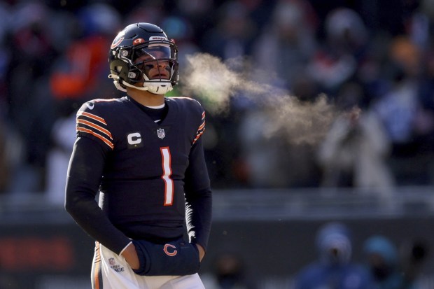 Bears QB Justin Fields looks on during the first quarter in the game against the Bills at Soldier Field on Dec. 24, 2022.