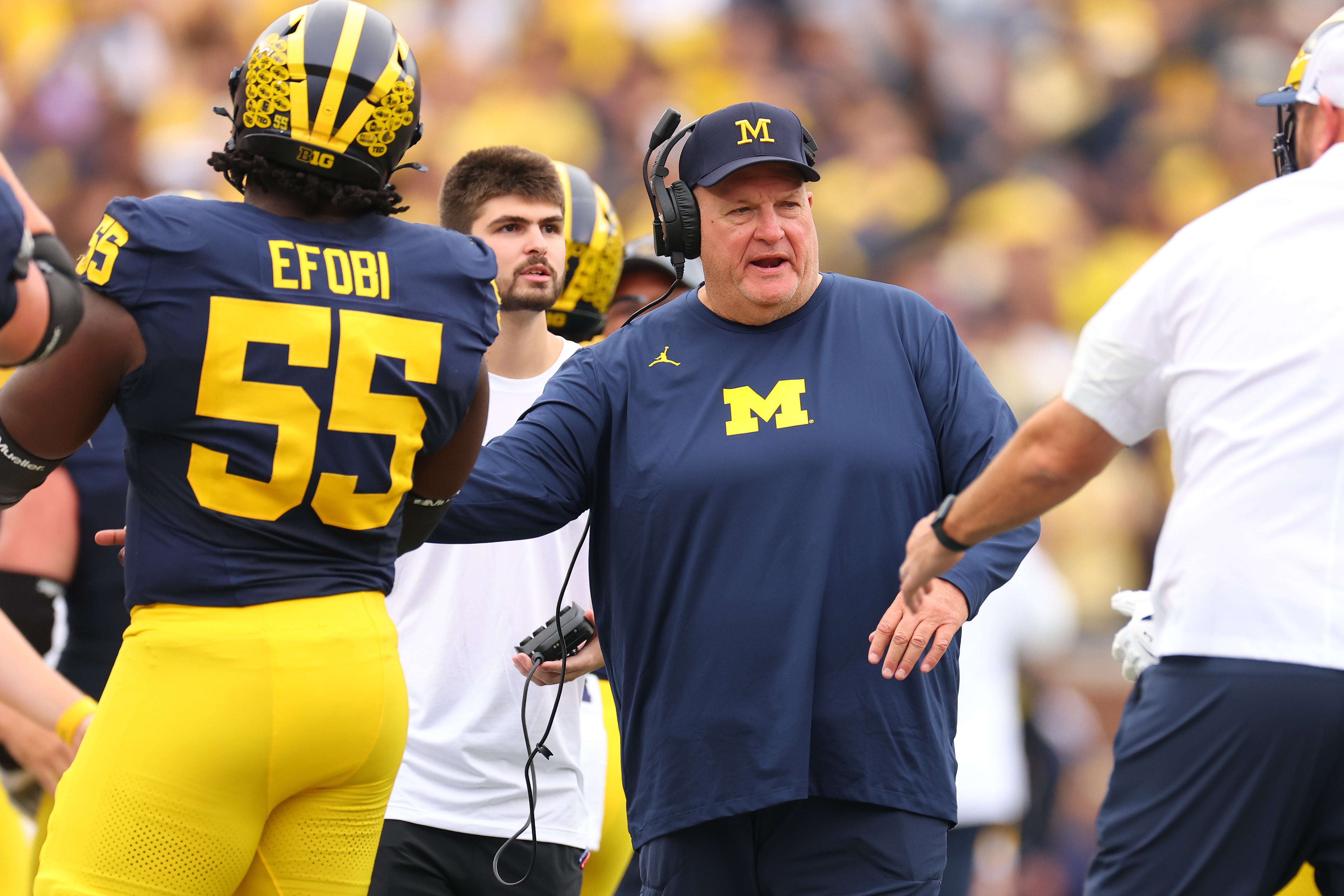 Associate coach Biff Poggi has been named as the University of Michigan’s interim head football coach