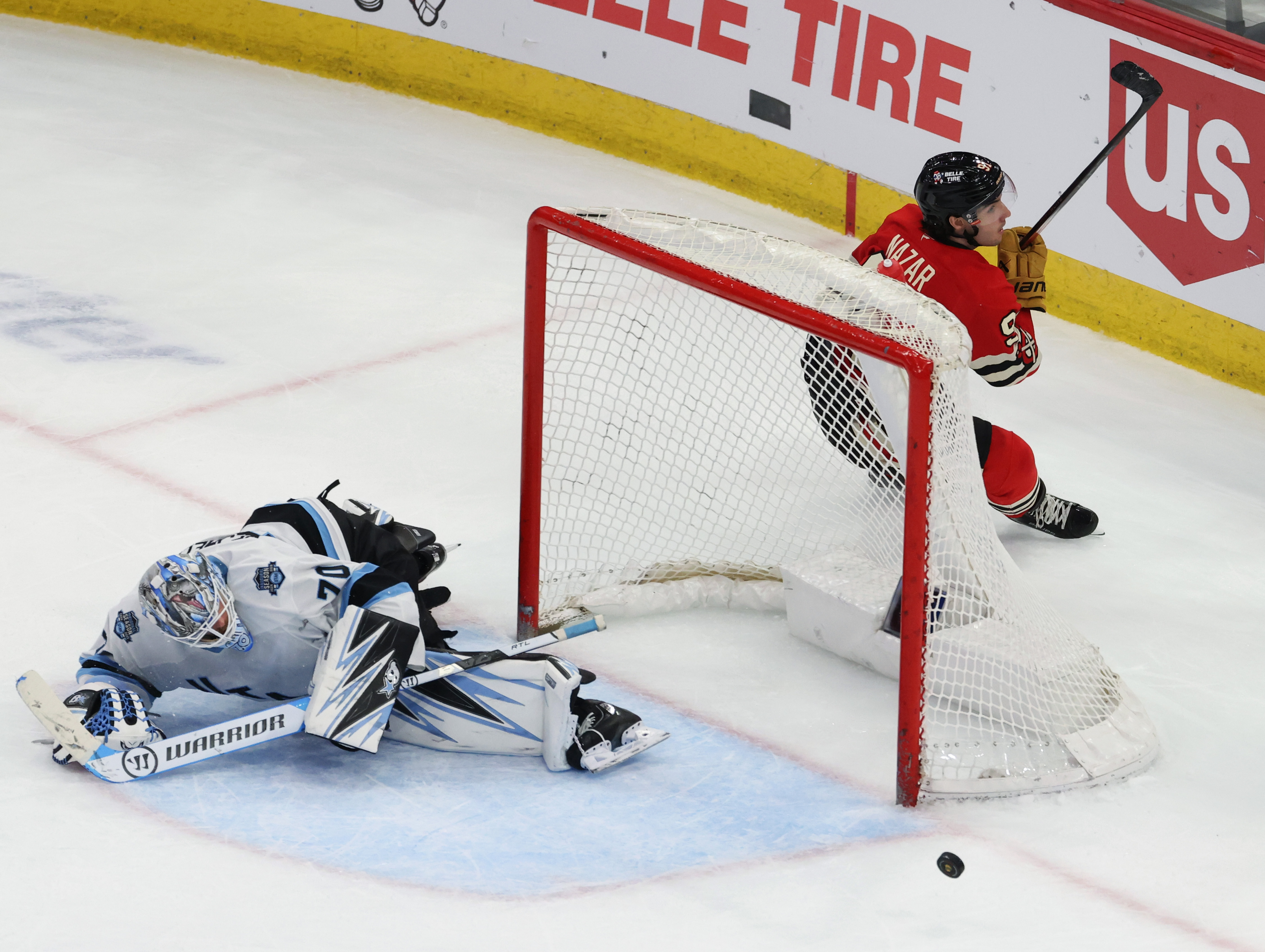 Blackhawks center Frank Nazar (91) scores a penalty goal past...