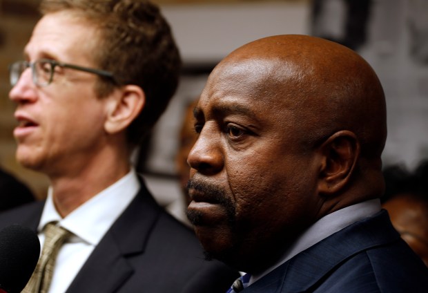 Former El Rukn gang member Nathson Fields, right, stands with his attorney Jon Loevy on Dec. 15, 2016 after a federal jury awarded $22 million in damages to Fields who claimed two Chicago police detectives framed him for an infamous 1984 double murder that sent him to death row. (Phil Velasquez/Chicago Tribune)
