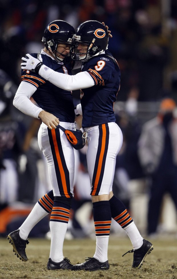 Robbie Gould (9) celebrates with holder Brad Maynard (4) after Gould's game-winning kick in overtime against the Green Bay Packers at Soldier Field in Chicago, Dec. 22, 2008. (Scott Strazzante/Chicago Tribune)