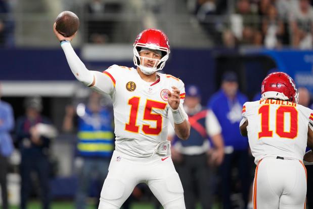 Kansas City Chiefs quarterback Patrick Mahomes throws during the second half of an NFL football game against the Dallas Cowboys Thursday, Nov. 27, 2025, in Arlington, Texas. (AP Photo/Tony Gutierrez)