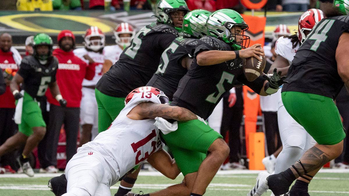 Indiana defensive lineman Kellan Wyatt sacks Oregon quarterback Dante Moore as the Oregon Ducks host the Indiana Hoosiers Oct. 11, 2025, at Autzen Stadium in Eugene, Oregon.