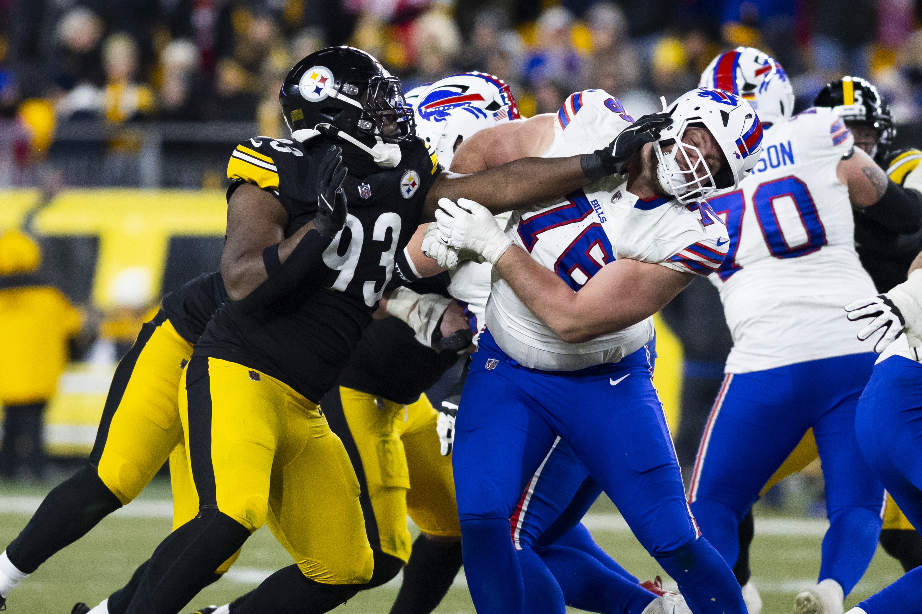 Pittsburgh Steelers defensive end Esezi Otomewo (93) & Buffalo Bills guard David Edwards (76) in-game. Pittsburgh Steelers vs. Buffalo BillsKylee Surike | Special to PennLive