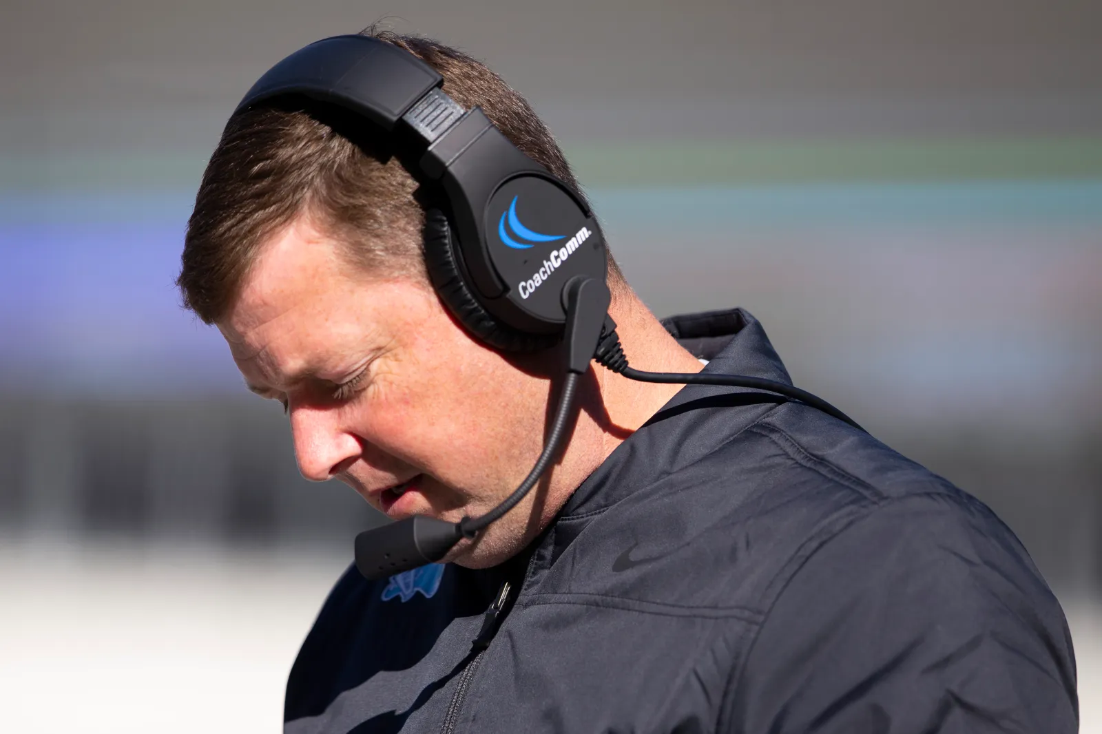 Offensive coordinator Will Hall of the Tulane Green Wave looks on