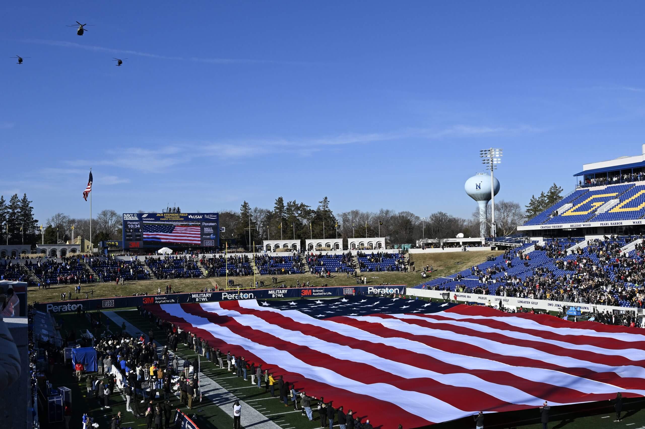 A view of Navy's Navy-Marine Corps Stadium with the American flag draped over the field. 