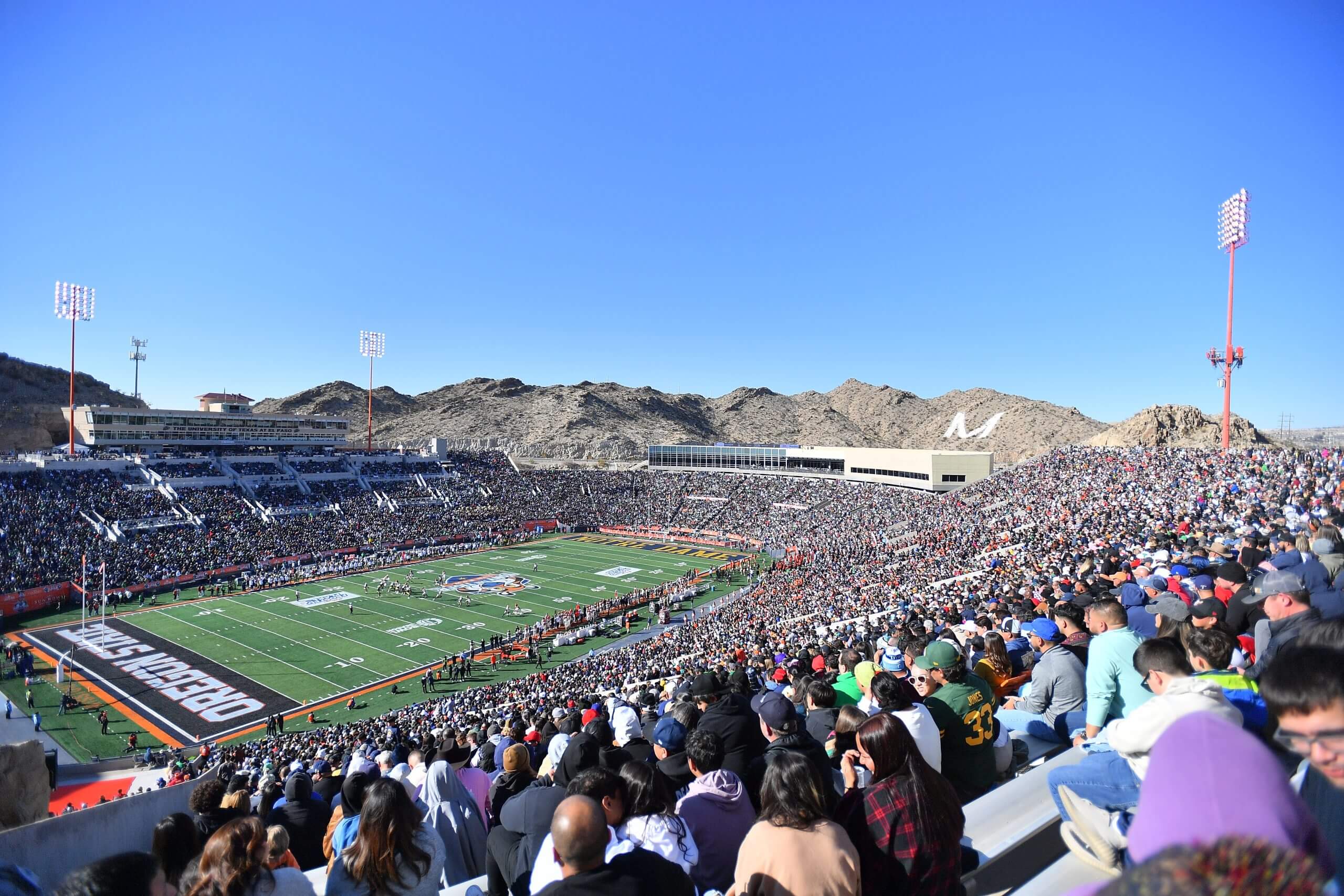 A view of UTEP's Sun Bowl in El Paso Texas with the mountains behind it. 