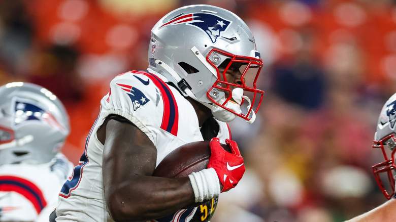 LANDOVER, MD - AUGUST 25: Terrell Jennings #29 of the New England Patriots carries the ball against the Washington Commanders during the fourth quarter of a preseason game at Commanders Field on August 25, 2024 in Landover, Maryland. (Photo by Scott Taetsch/Getty Images)