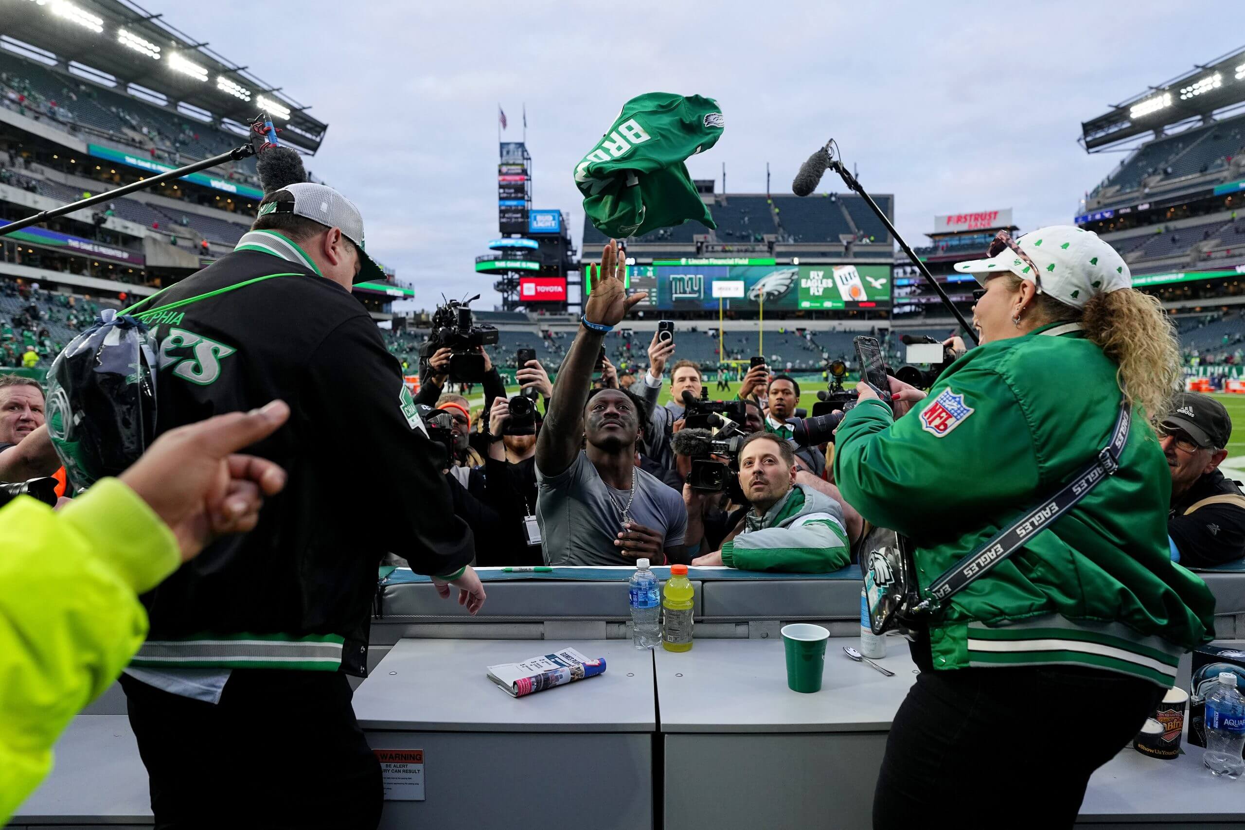 A.J. Brown #11 of the Philadelphia Eagles tosses his jersey to a fan after defeating the Dallas Cowboys 41-7 at Lincoln Financial Field