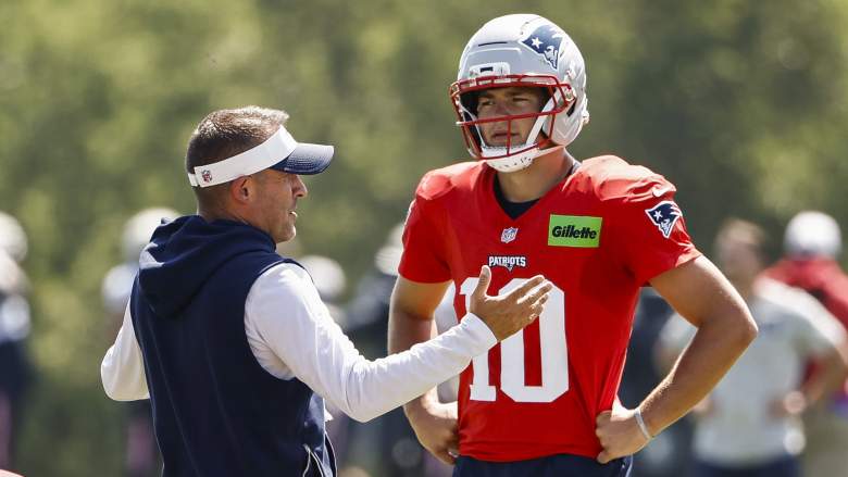 Josh McDaniels offensive coordinator of the New England Patriots and quarterback Drake Maye