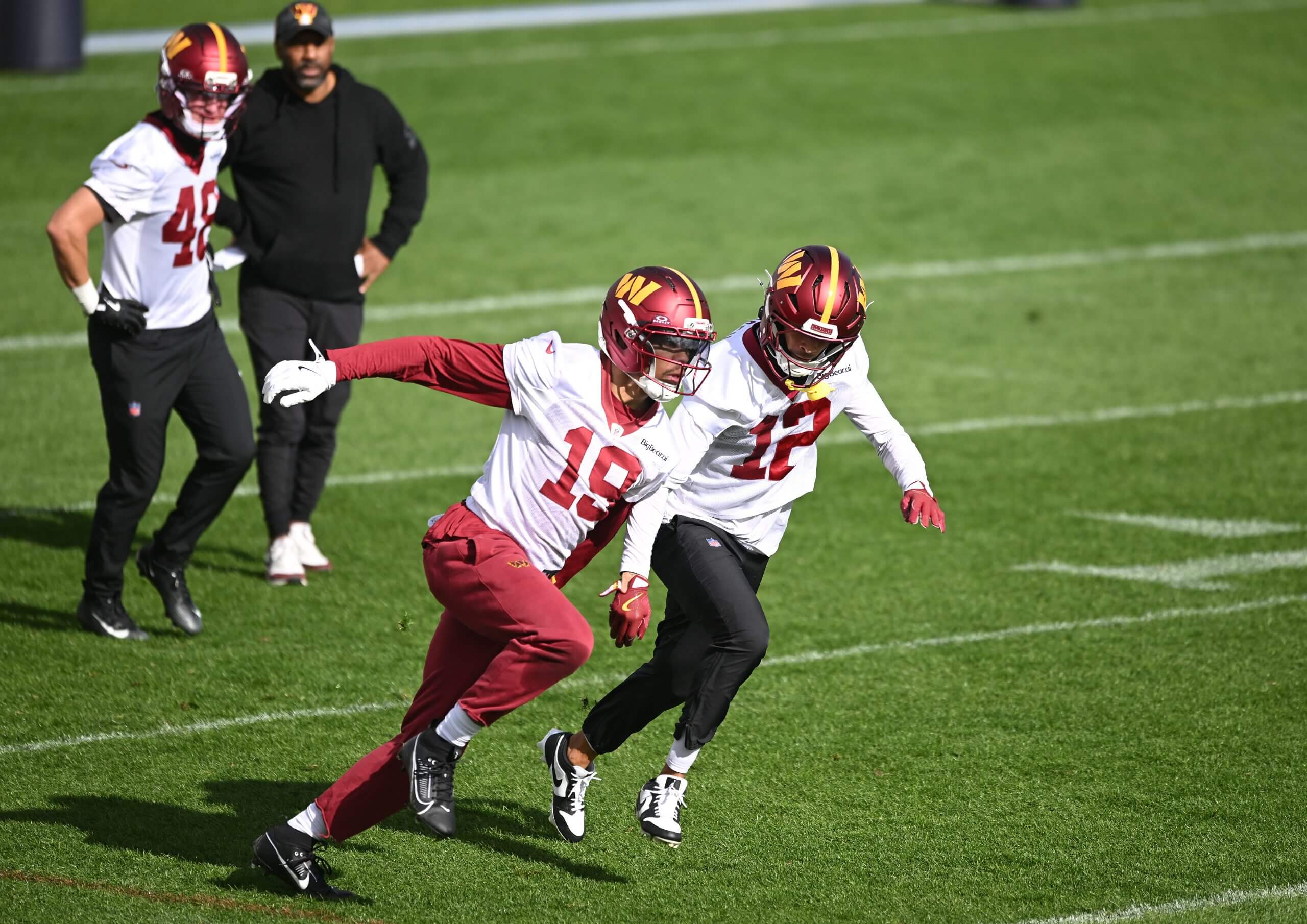 Washington Commanders receivers Chris Moore and Robbie Chosen during a practice in Madrid..