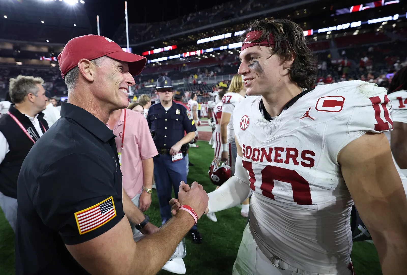 Oklahoma head coach Brent Venables and QB John Mateer