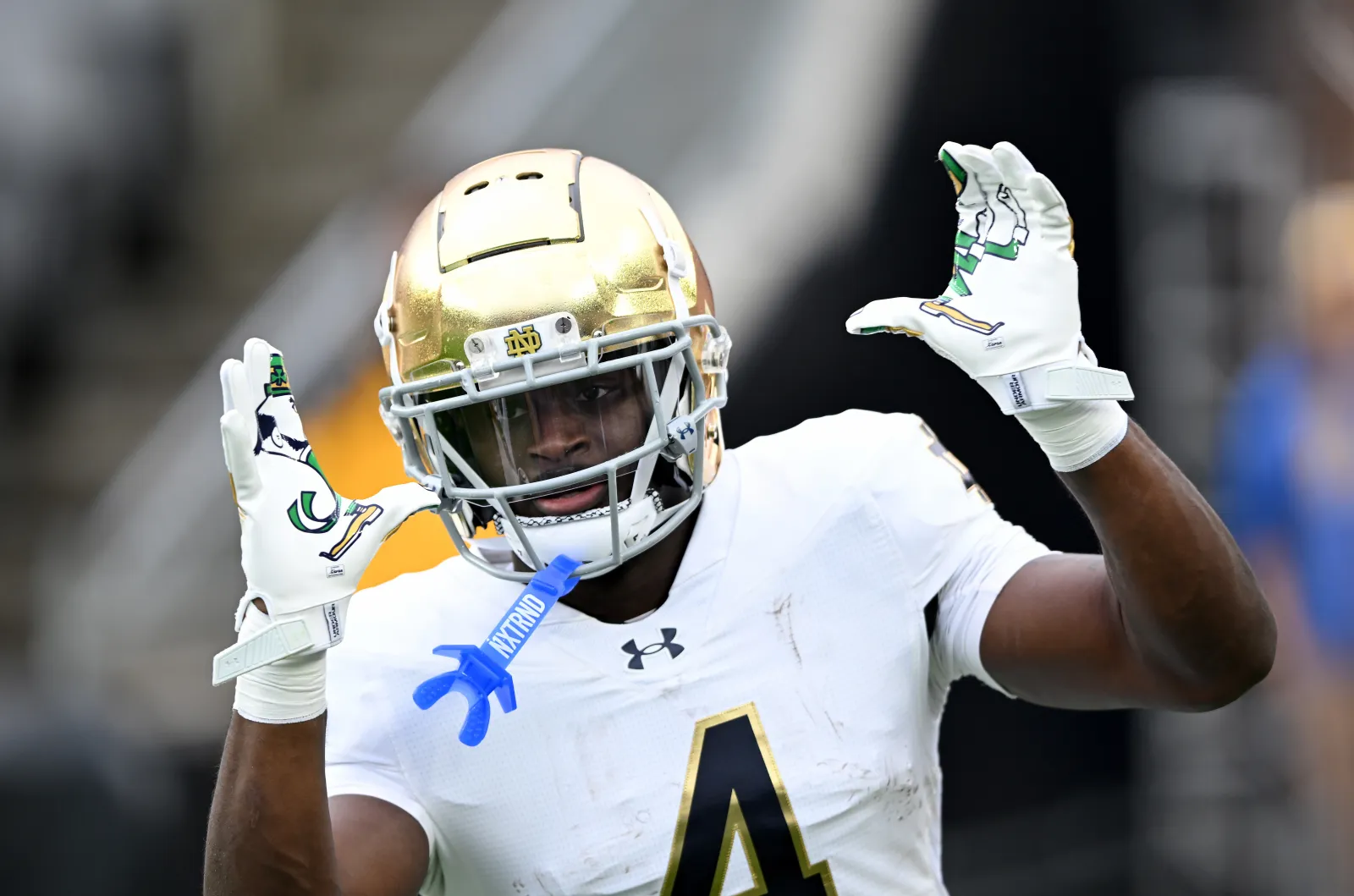 Jeremiyah Love #4 of the Notre Dame Fighting Irish celebrates after scoring a touchdown against the Pittsburgh Panthers