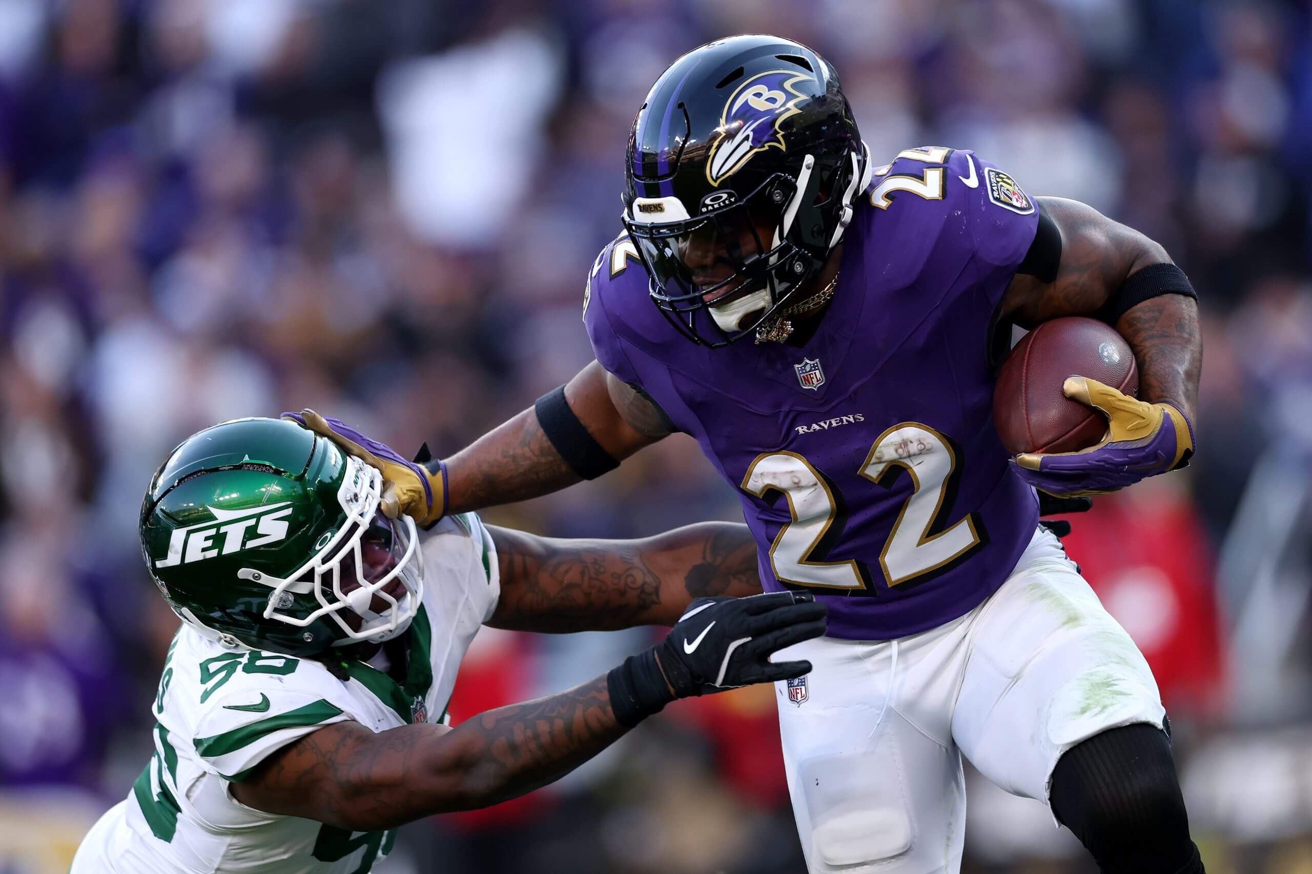 Baltimore Ravens running back Derrick Henry stiff-arms the Jets' Quincy Williams during a November 2025 game. (Photo by Patrick Smith/Getty Images)