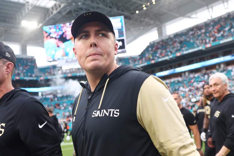 Kellen Moore looks on during an NFL game.