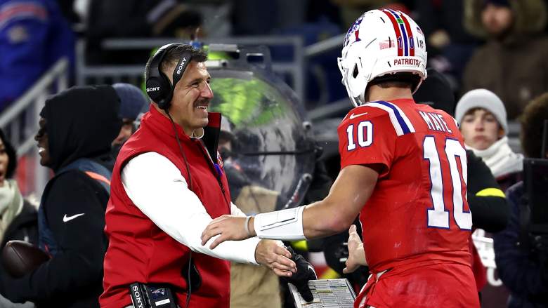 Head coach Mike Vrabel of the New England Patriots and QB Drake Maye