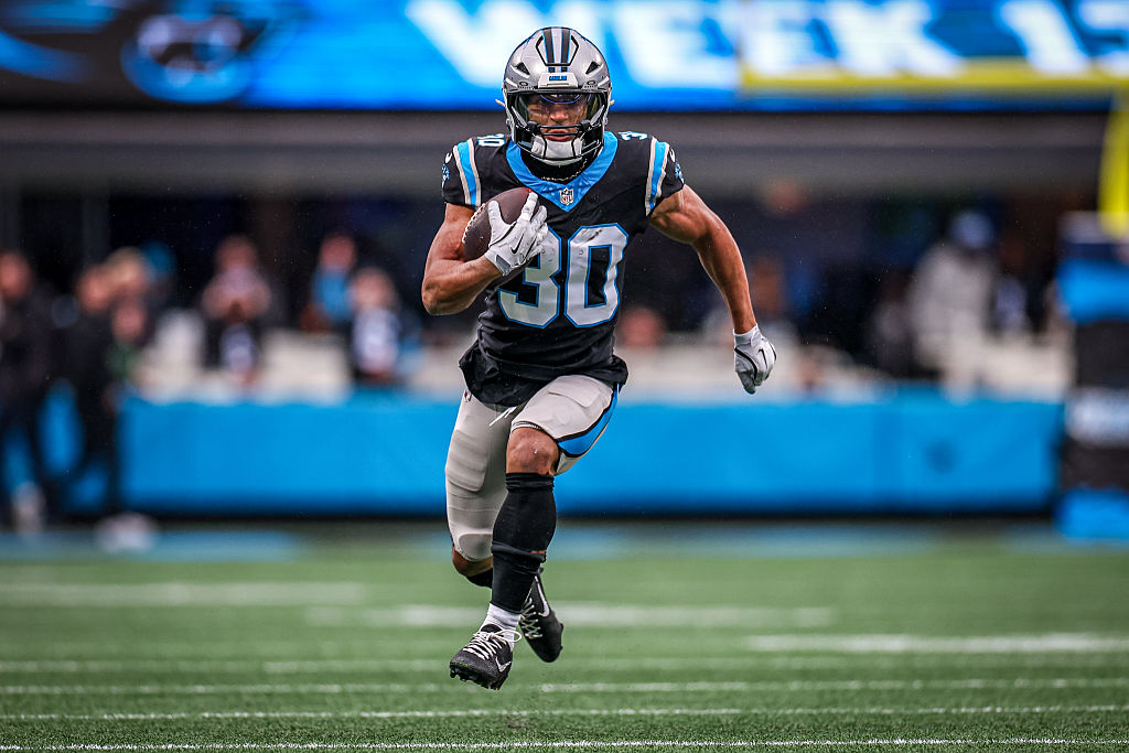 CHARLOTTE, NORTH CAROLINA - NOVEMBER 30: Chuba Hubbard #30 of the Carolina Panthers runs the ball during the first half of an NFL game against the Los Angeles Rams at Bank of America Stadium on November 30, 2025 in Charlotte, North Carolina. (Photo by David Jensen/Getty Images)