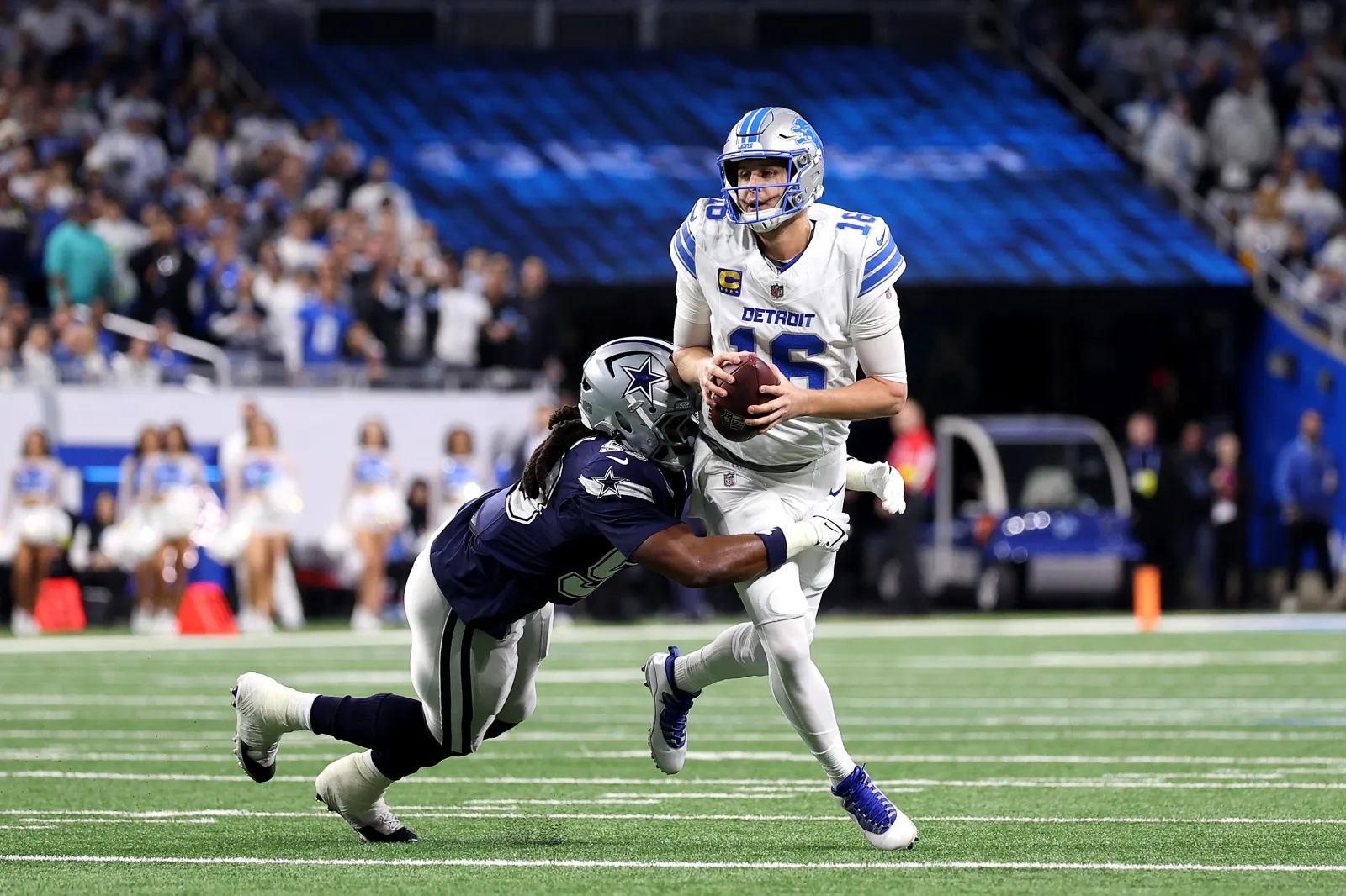 Detroit Lions QB Jared Goff is wrapped up by Dallas Cowboys DE James Houston