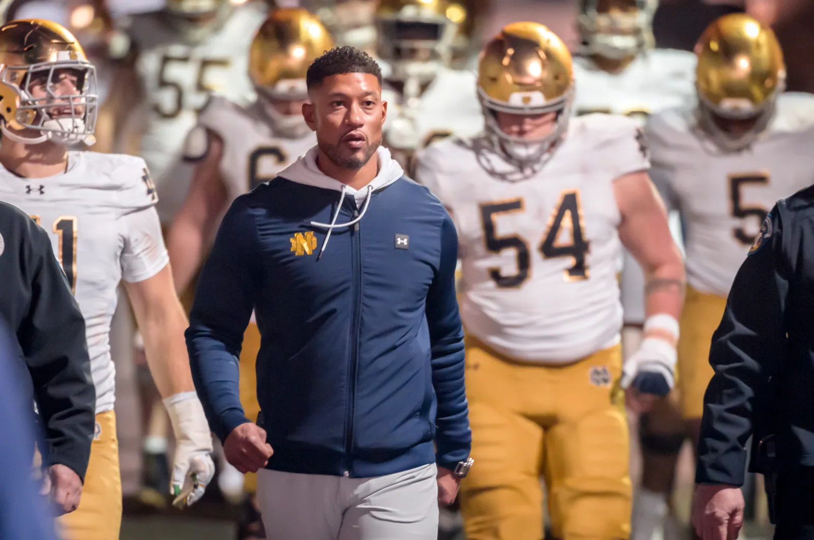 Notre Dame Fighting Irish head coach Marcus Freeman with players