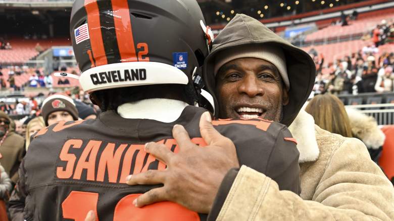 Deion Sanders shares an embrace with his son, Cleveland Browns QB Shedeur Sanders.