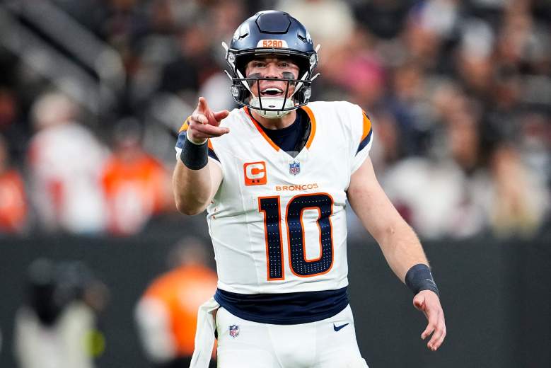 Bo Nix reacts after a play in an NFL game.