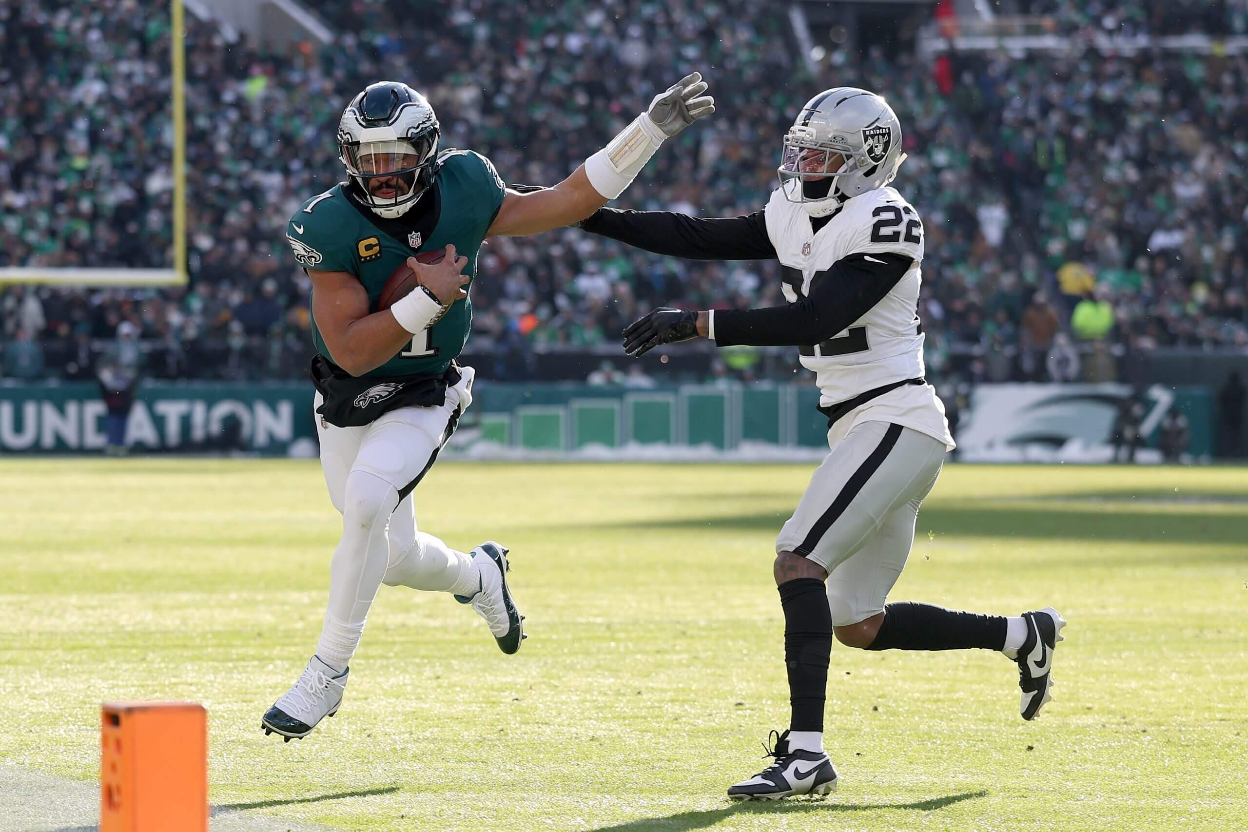 Jalen Hurts carries the ball during the Eagles' win over the Raiders.