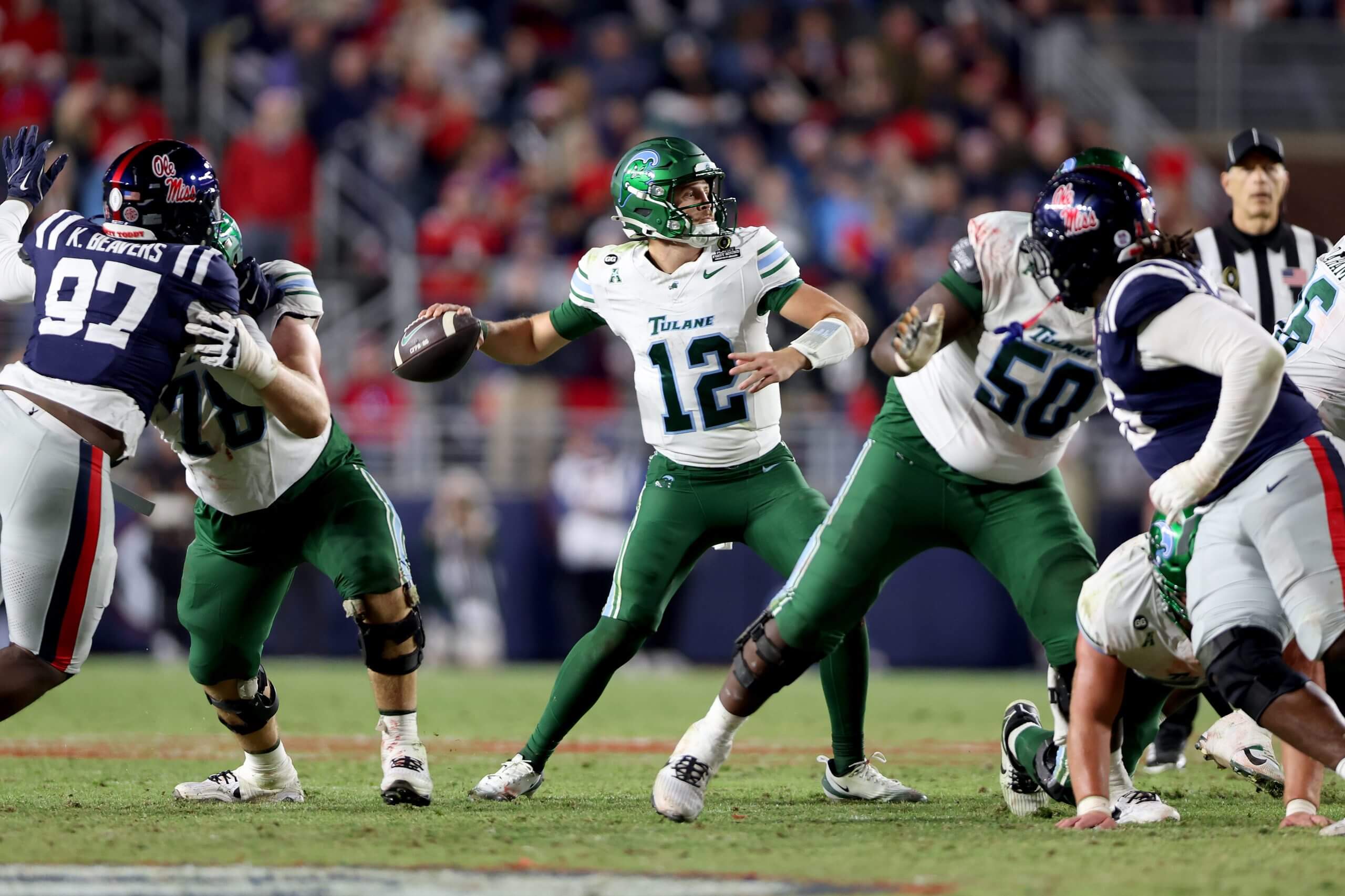 Tulane quarterback Jake Retzlaff makes a pass.