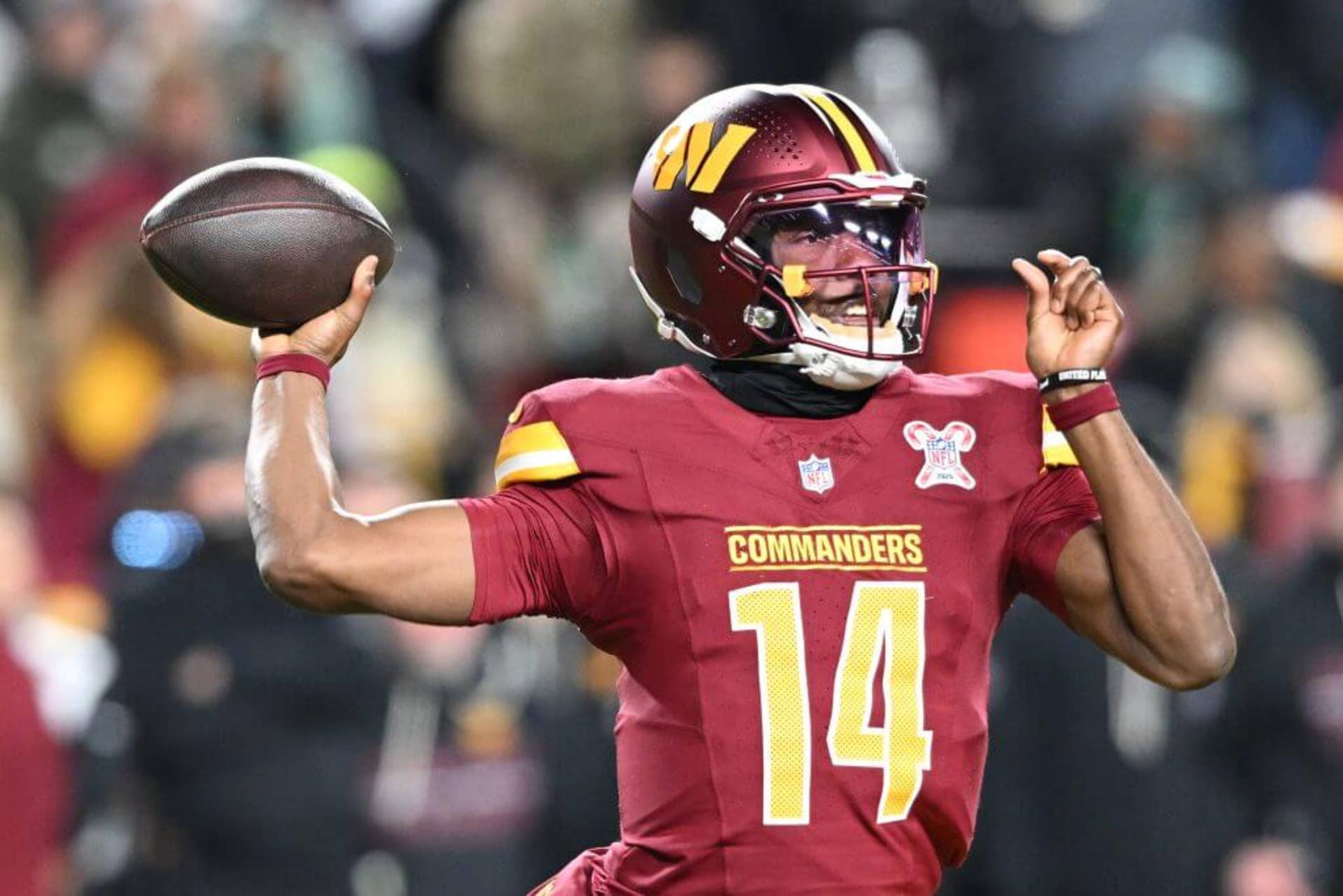 Josh Johnson looks to pass during a Commanders loss to the Eagles.