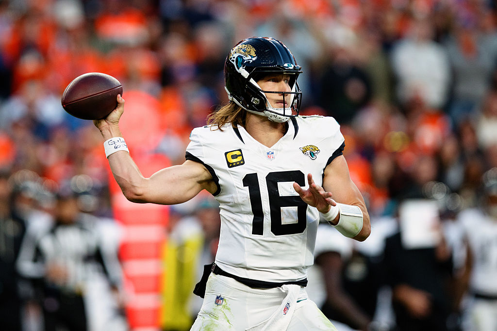 DENVER, CO - DECEMBER 21: Trevor Lawrence #16 of the Jacksonville Jaguars looks to pass during the third quarter against the Denver Broncos at Empower Field at Mile High on December 21, 2025 in Denver, Colorado. (Photo by Justin Edmonds/Getty Images)