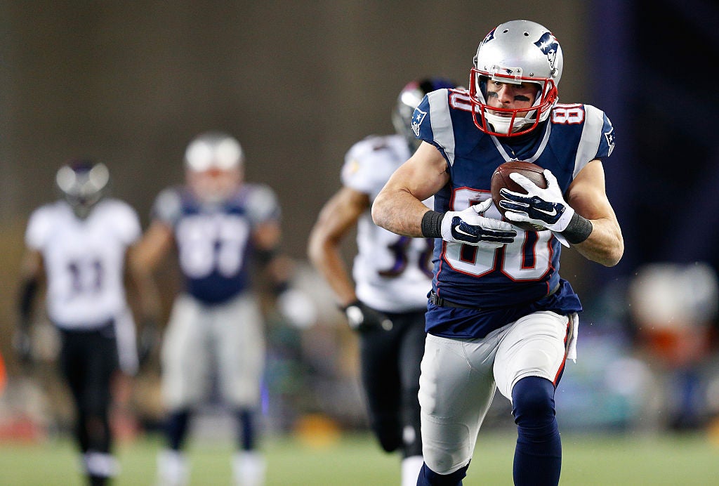 FOXBORO, MA - JANUARY 10:  Danny Amendola #80 of the New England Patriots scores a touchdown in the third quarter against the Baltimore Ravens during the 2015 AFC Divisional Playoffs game at Gillette Stadium on January 10, 2015 in Foxboro, Massachusetts.  (Photo by Jim Rogash/Getty Images)
