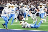 Dallas Cowboys wide receiver Ryan Flournoy (19) flies into the end zone for a touchdown...