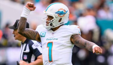 Miami Dolphins quarterback Tua Tagovailoa raised his fist as he celebrated running back De'Von Achane scoring a touchdown against the New Orleans Saints in Miami Gardens, Fla., on Saturday.