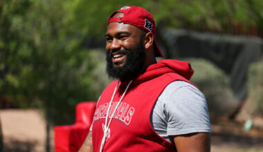 Cardinals DL coach Winston DeLattiboudere at rookie minicamp...