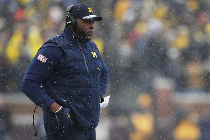 Ex-Michigan football coach Sherrone Moore detained by Saline police on potential charges, ESPN reports