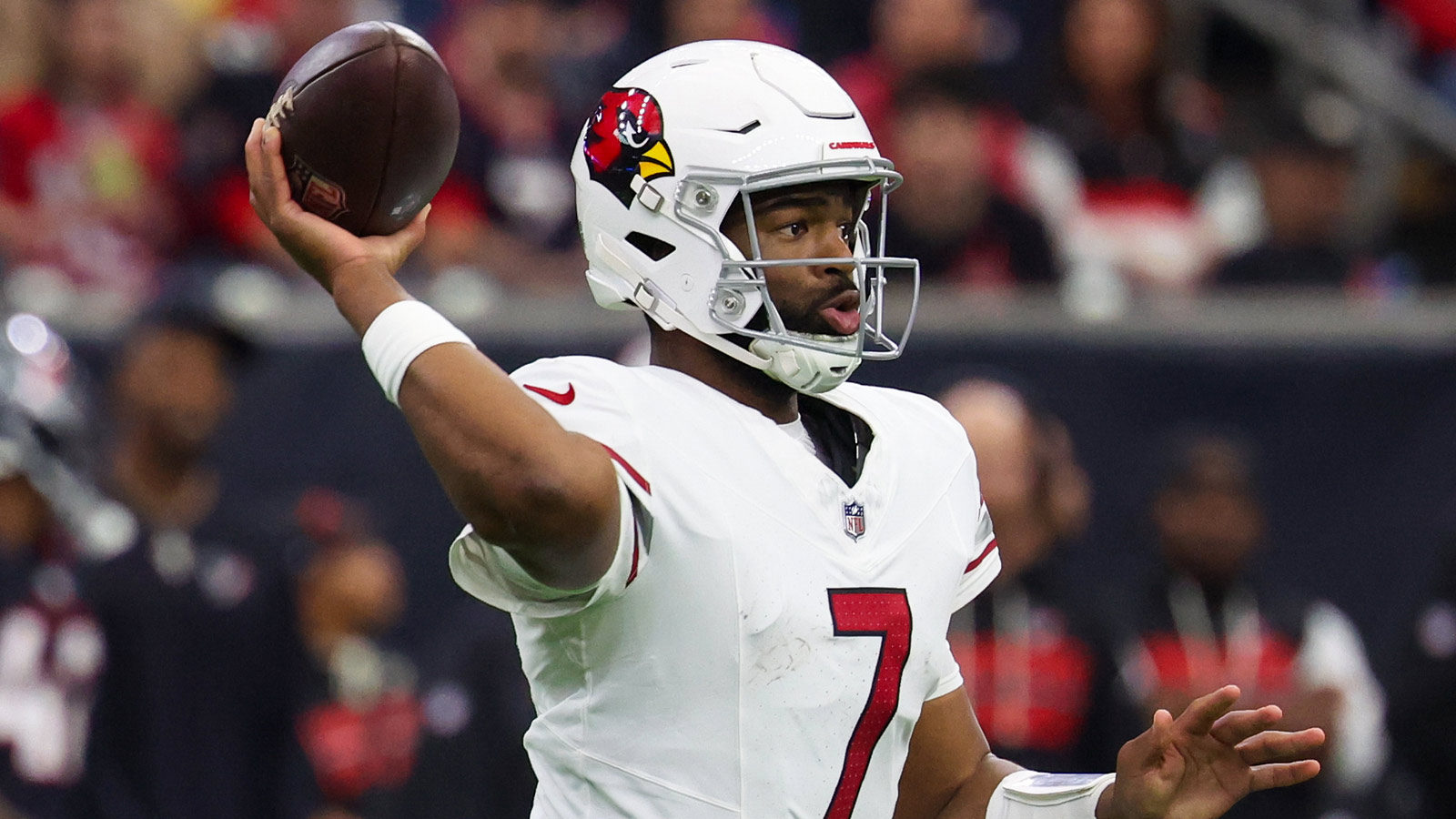 Arizona Cardinals quarterback Jacoby Brissett (7) drops back to pass against the Houston Texans in the third quarter at NRG Stadium.