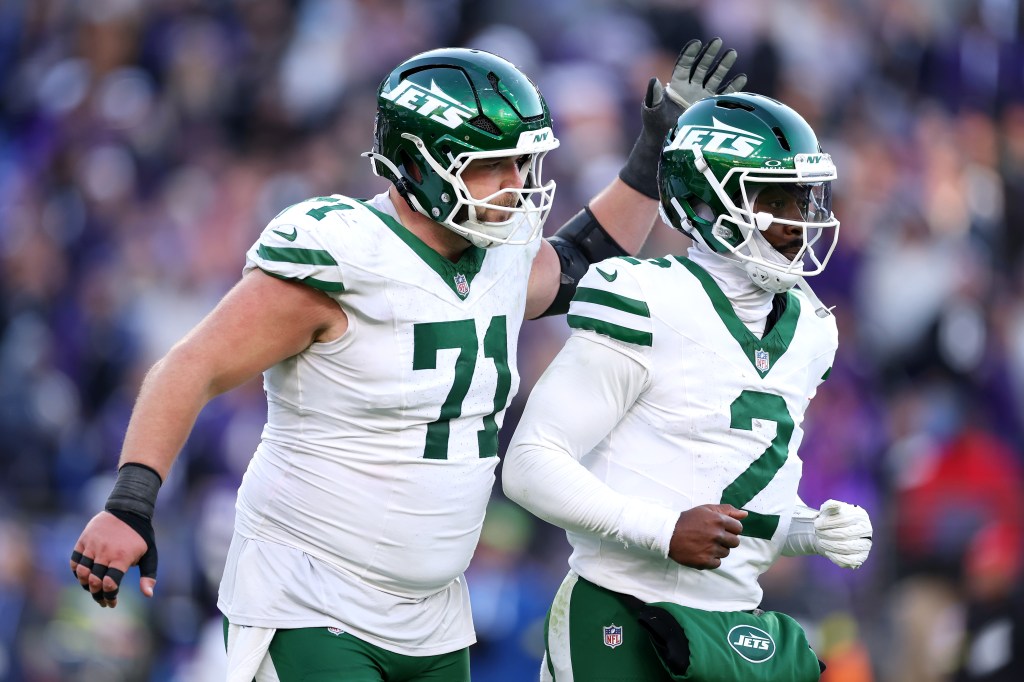 Josh Myers (left, with Tyrod Taylor) has started every game at center or the Jets this season.