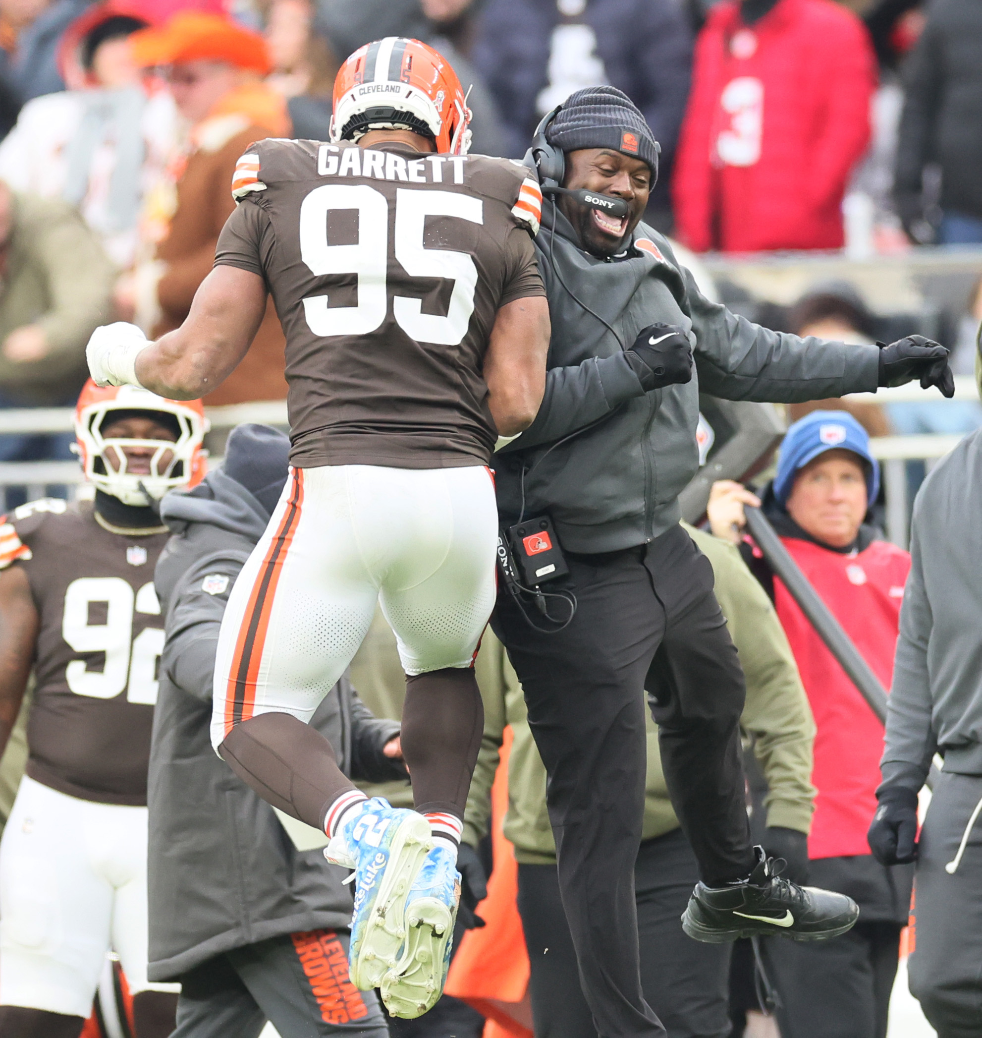 Cleveland Browns defensive end Myles Garrett celebrates his sack on San Francisco 49ers quarterback Brock Purdy with defensive line coach Jacques Cesaire in the second half at Huntington Bank Field.