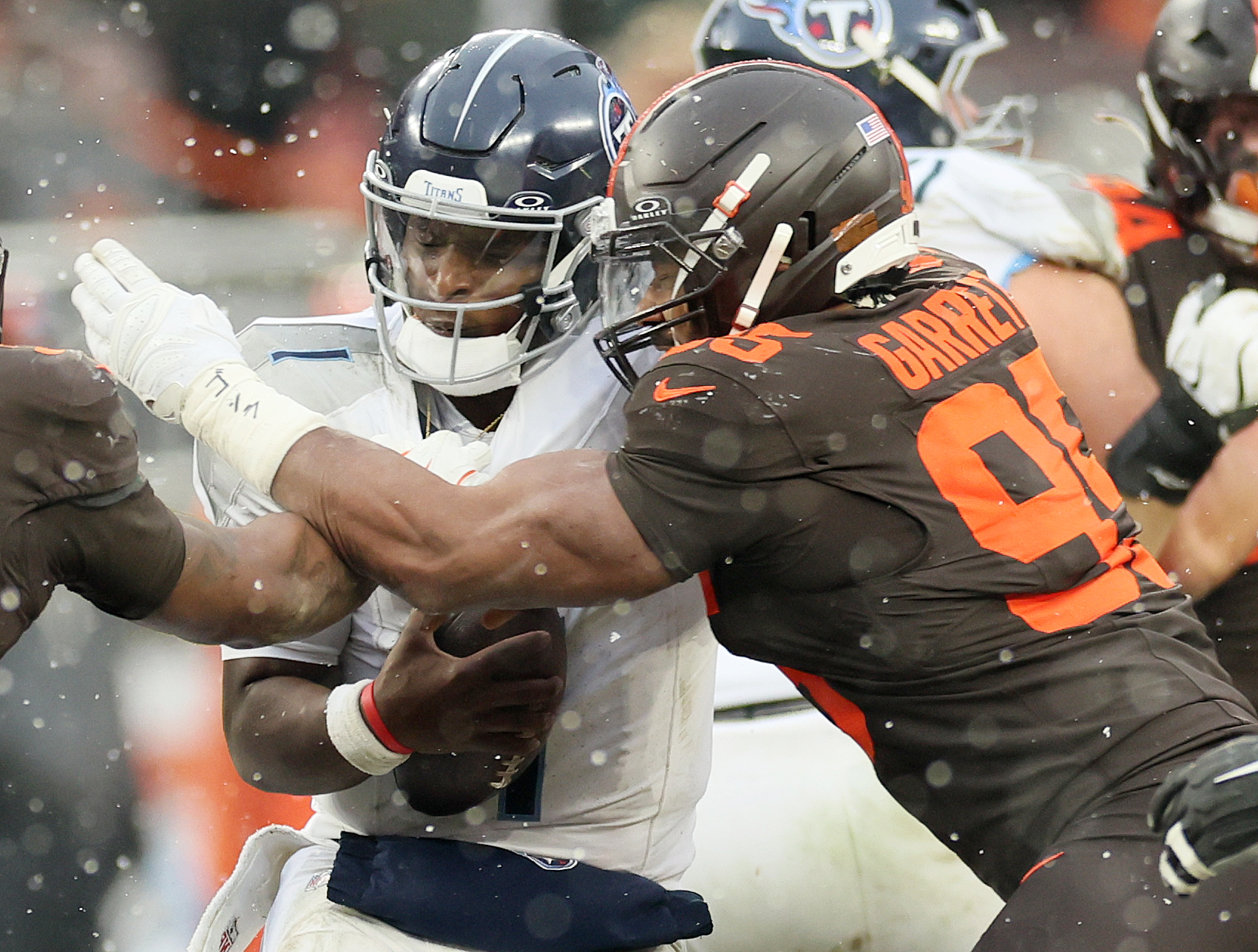 Cleveland Browns defensive end Myles Garrett sacks Tennessee Titans quarterback Cam Ward in the first half at Huntington Bank Field.