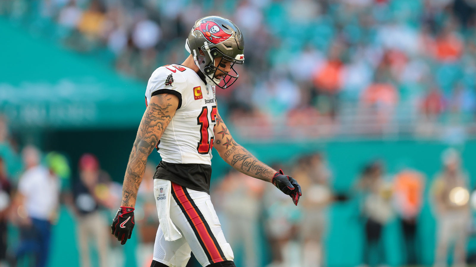 Tampa Bay Buccaneers wide receiver Mike Evans (13) walks on the field during the fourth quarter against the Miami Dolphins at Hard Rock Stadium.